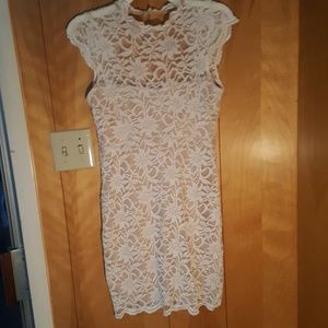 White dress with nude under garment